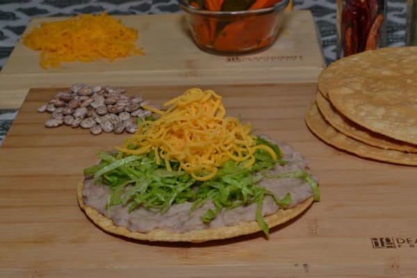 Order Beans Tostada food online from Federico's Mexican Food store, Phoenix on bringmethat.com