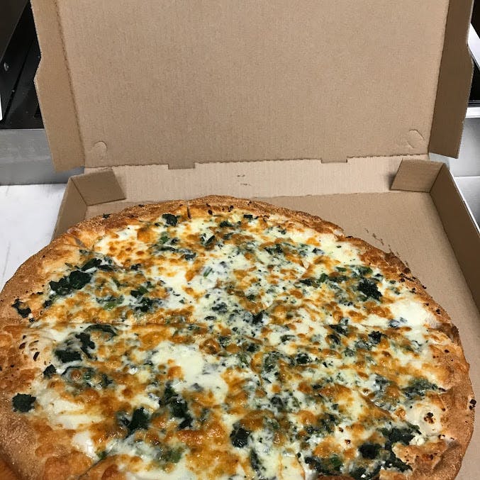 Order Spinach Pie Pizza - Small 10'' food online from Checkmate Cafe store, Roslindale on bringmethat.com