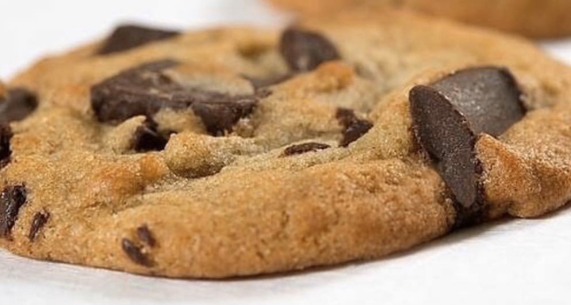 Order Chocolate Chip Chunk Colossal Size Cookie food online from Colossal Cupcakes store, Cleveland on bringmethat.com