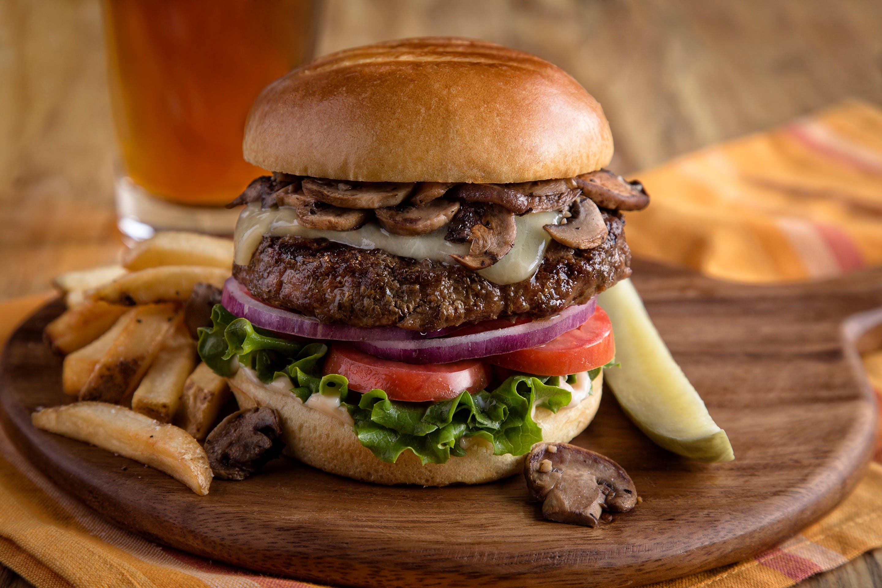 Order Aged Cheddar & Mushroom Burger - Burger food online from Uno Pizzeria & Grill store, Chester on bringmethat.com