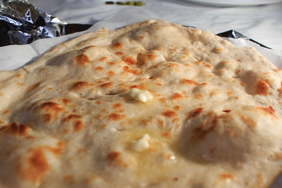 Order Naan food online from Dhaba Indian Kitchen store, Northville on bringmethat.com