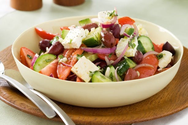 Order Greek Salad - Salad food online from Oscar's Pizza store, Colonie on bringmethat.com