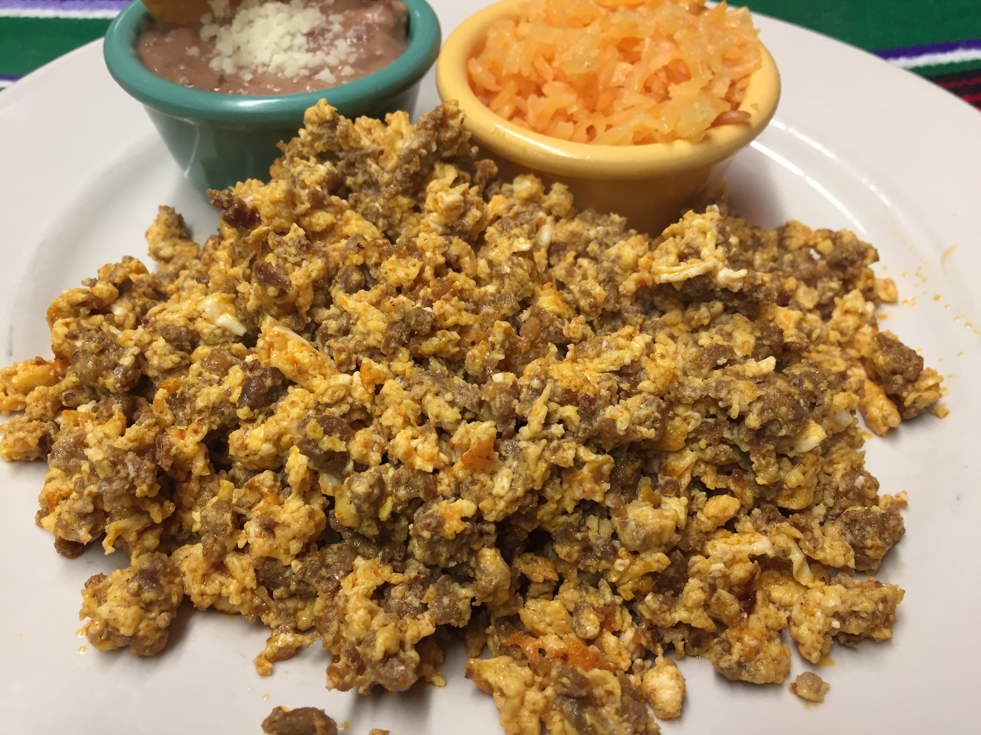 Order HUEVOS CON CHORIZO food online from Montes Cafe store, Seaside Heights on bringmethat.com