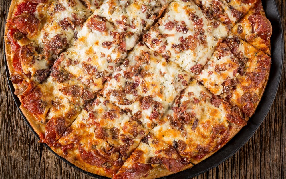 Order Meat Mania Pizza - 12" (12 Slices) (Served 2 People) food online from Rosati's Pizza store, Genoa on bringmethat.com