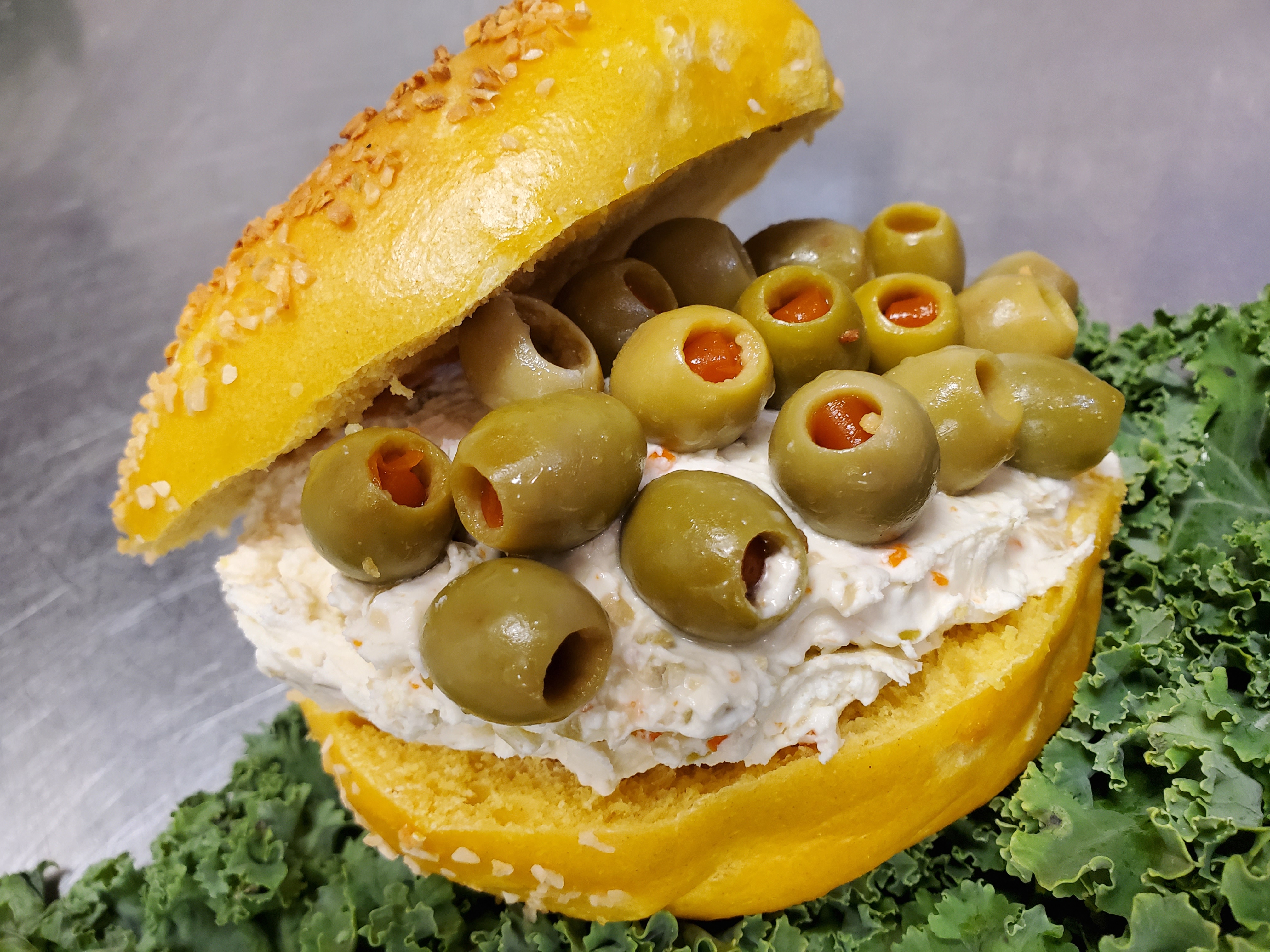 Order Olive Cream Cheese food online from East Northport Bagel Cafe store, East Northport on bringmethat.com