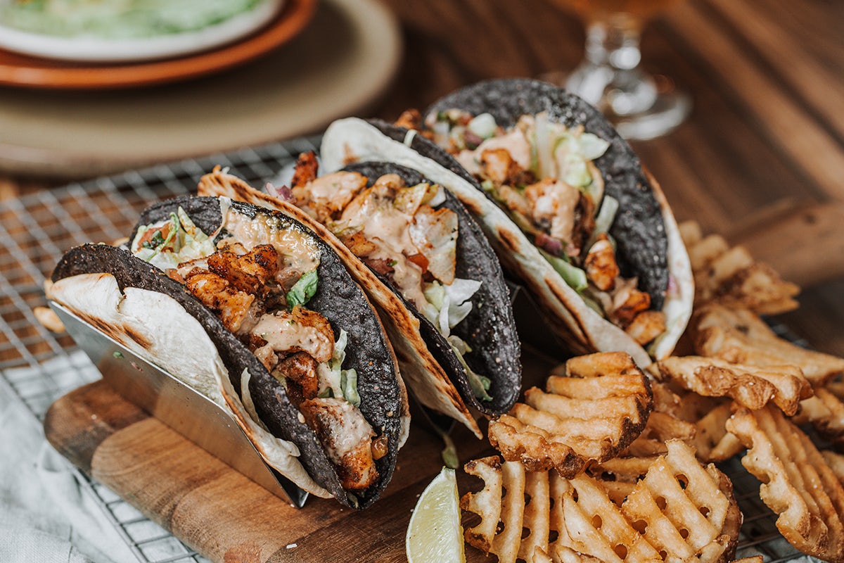 Order CAJUN FISH TACOS food online from Rock Bottom Brewery store, Orland Park on bringmethat.com