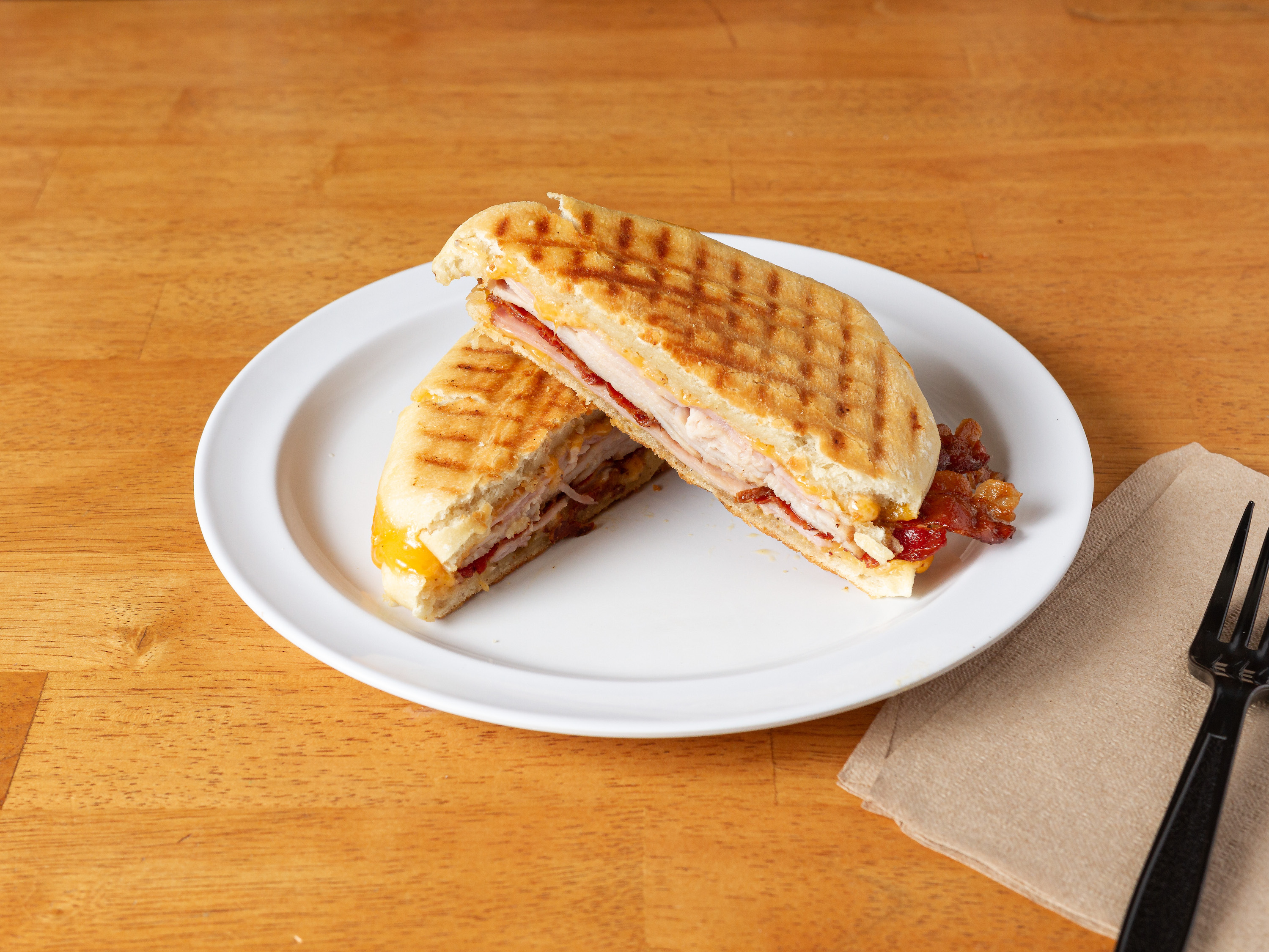Order Uncle Carroll Hot Panini Savory food online from Grind N Crepe store, Occoquan on bringmethat.com