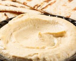 Order Hummus food online from Pita Grill store, Buena Park on bringmethat.com