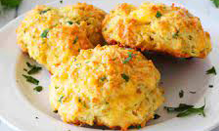 Order Xtra Cheddar Herb Biscuit (GF) food online from Mahana Fresh store, Charlotte on bringmethat.com