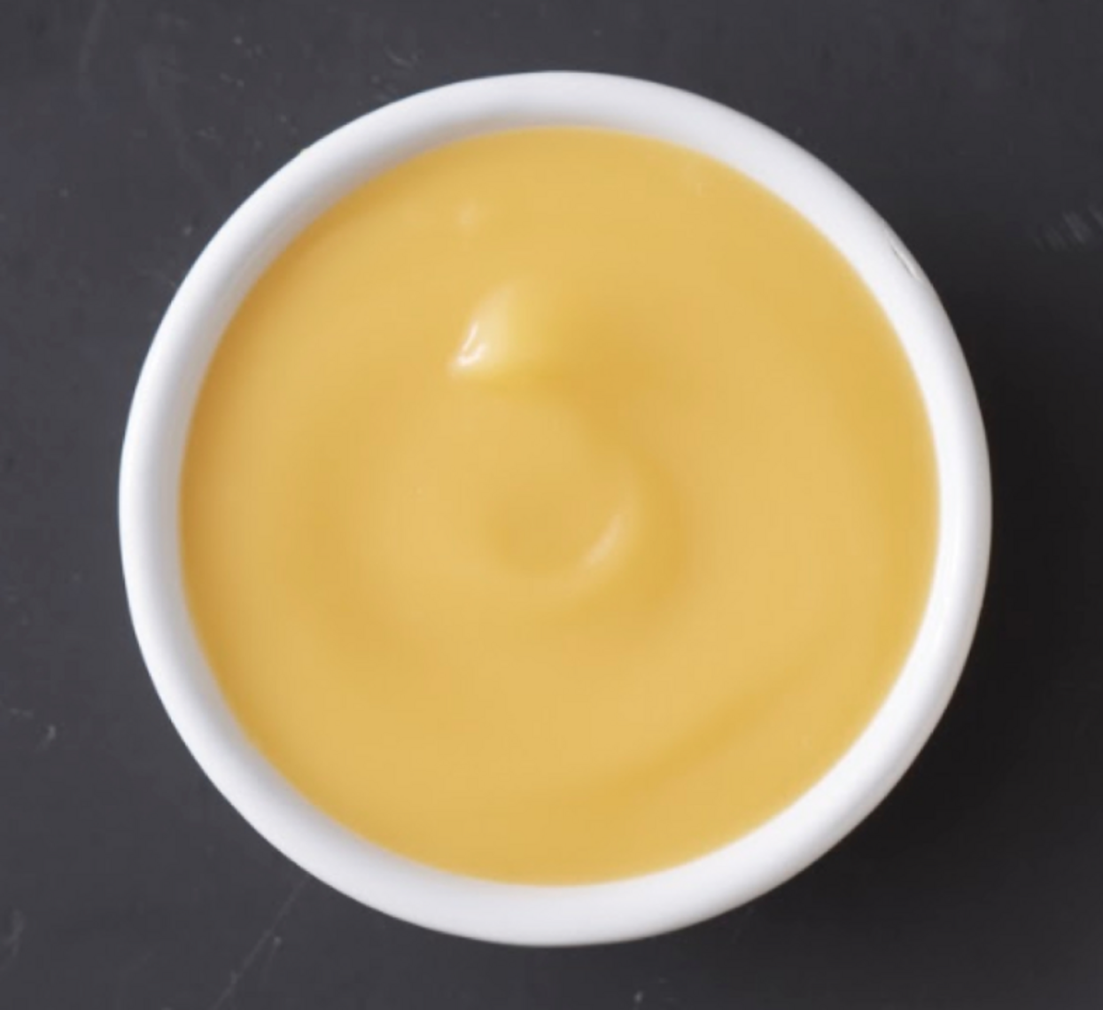 Order Cheese Sauce (2 oz) food online from Wings Over store, Pittsburgh on bringmethat.com