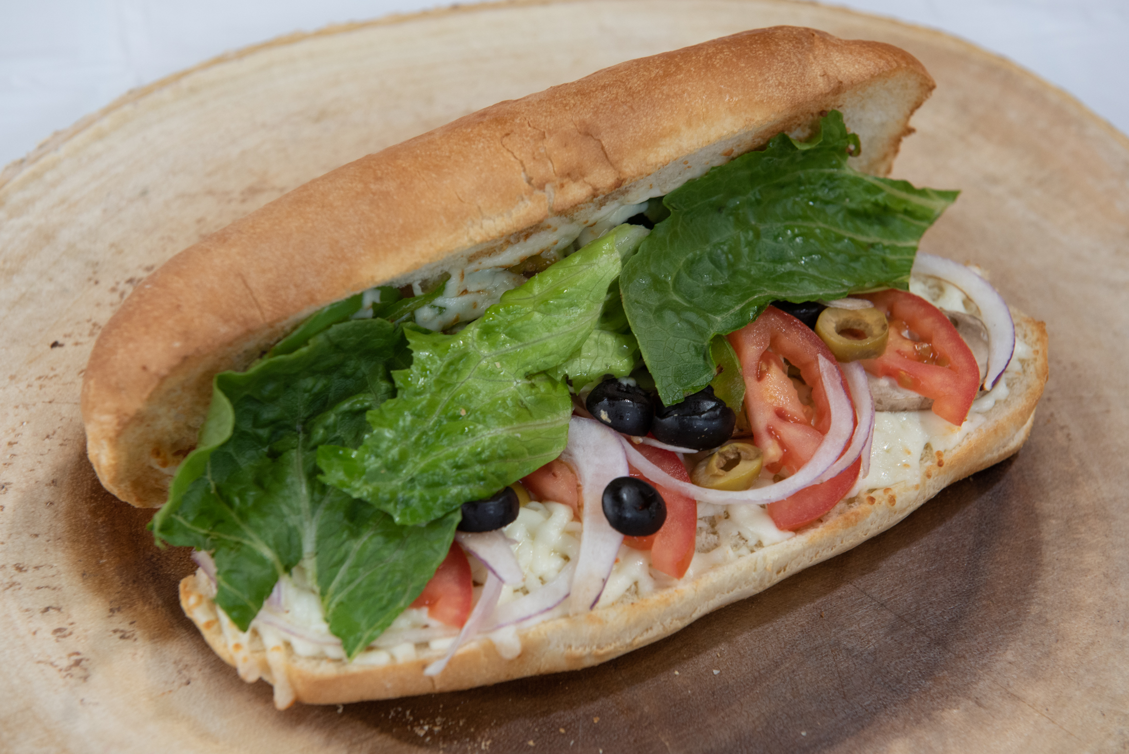 Order Vegetable Sub  food online from Milanos Pizzeria store, Nashville on bringmethat.com