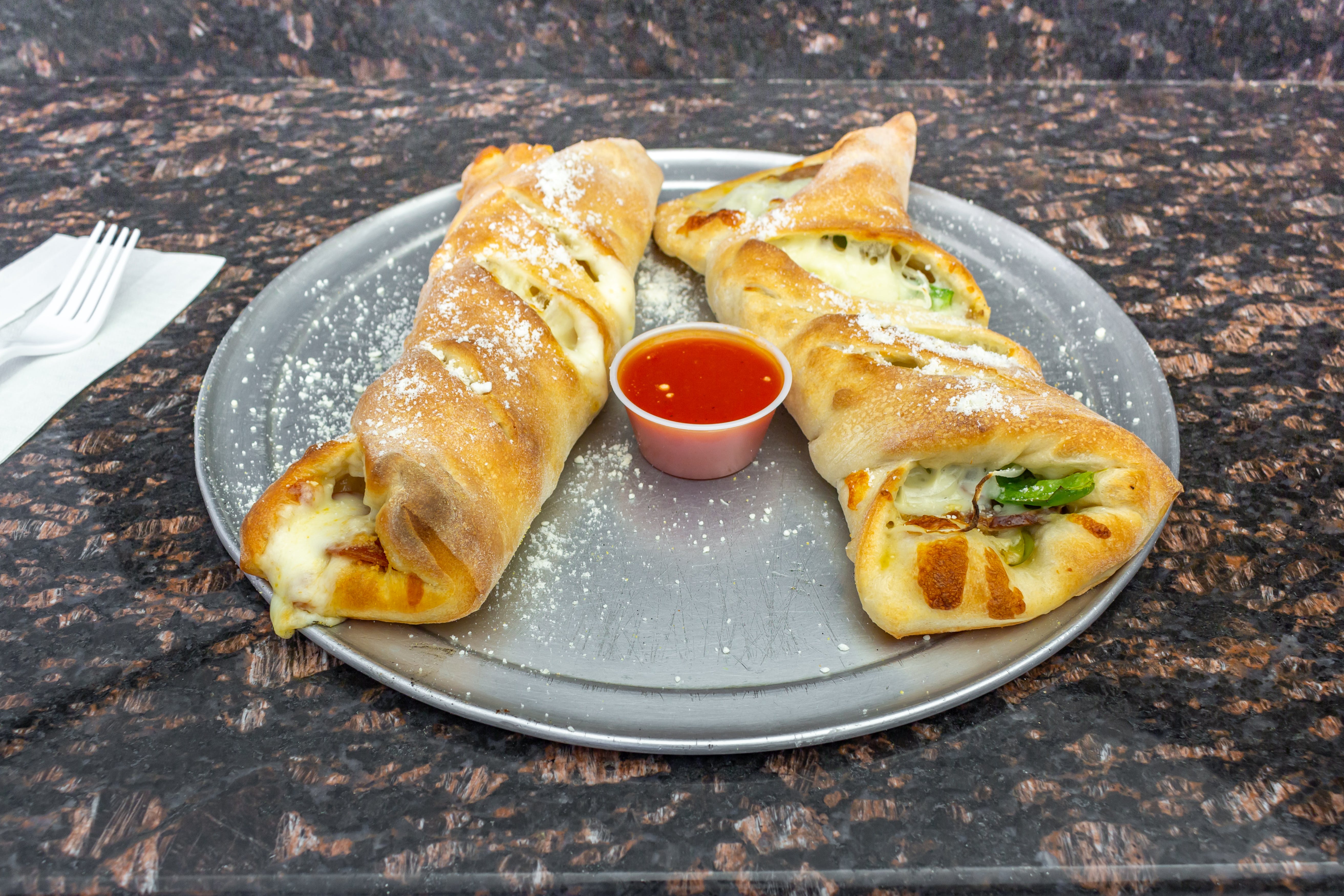 Order Chicken, Spinach, Cheese Stromboli - Stromboli food online from Angelo Pizzeria store, Bogota on bringmethat.com