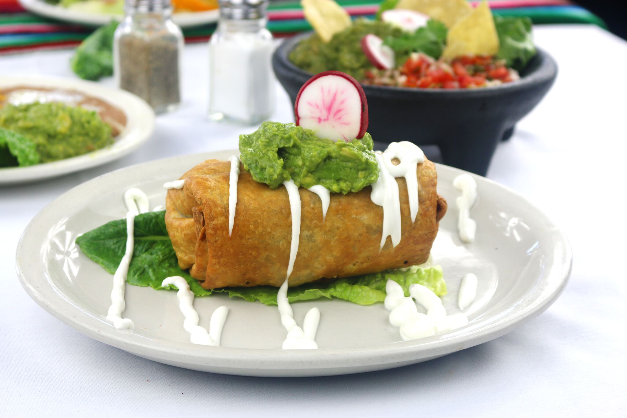 Order Chimichanga Burrito food online from Fiesta Martin Tacos store, Inglewood on bringmethat.com