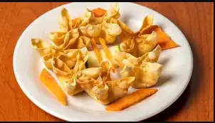 Order 4 Piece Crab Rangoon food online from Manning Chinese Buffet store, Reedley on bringmethat.com