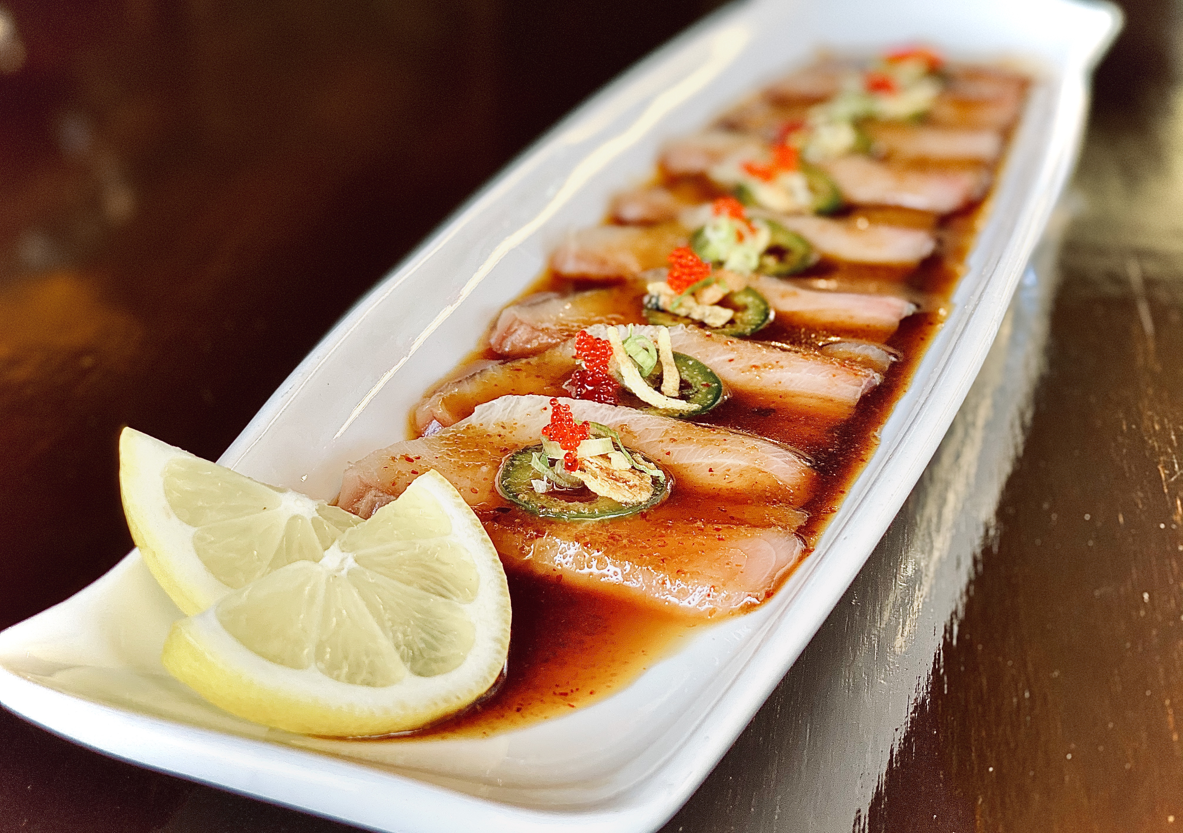 Order HAMACHI JALAPENO food online from Bluefin Sushi Thai store, Alameda on bringmethat.com