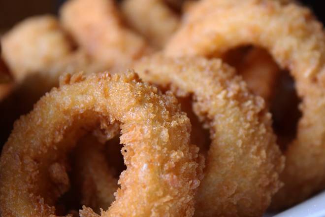 Order CRISPY ONION RINGS food online from 54th Street Grill & Bar - store, St. Louis on bringmethat.com