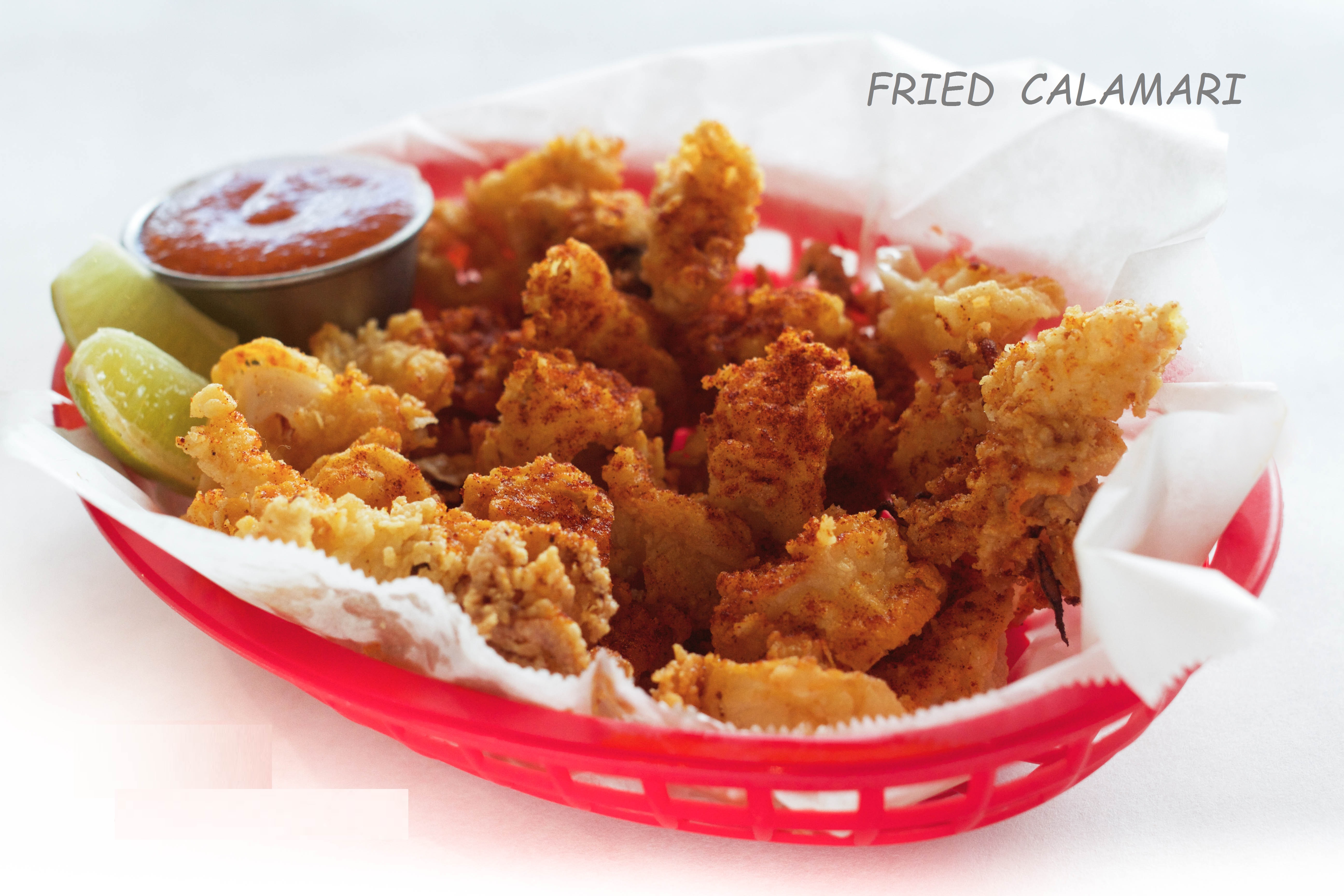 Order Fried Calamari food online from Cajun House store, San Francisco on bringmethat.com