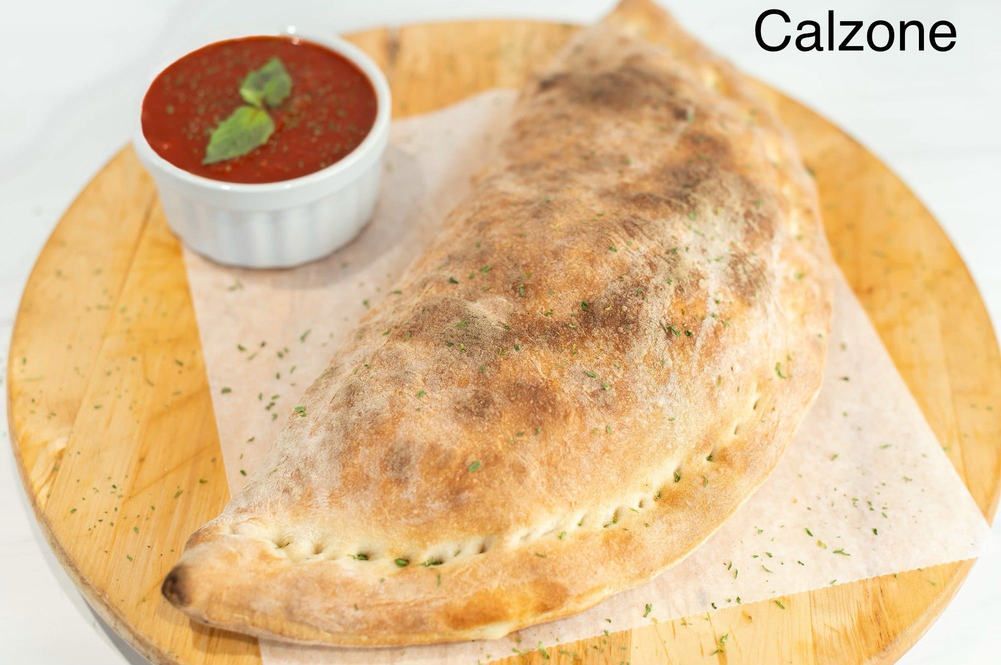 Order 4 Brothers Calzone - Calzone food online from Four Brothers Pizza store, Westport on bringmethat.com