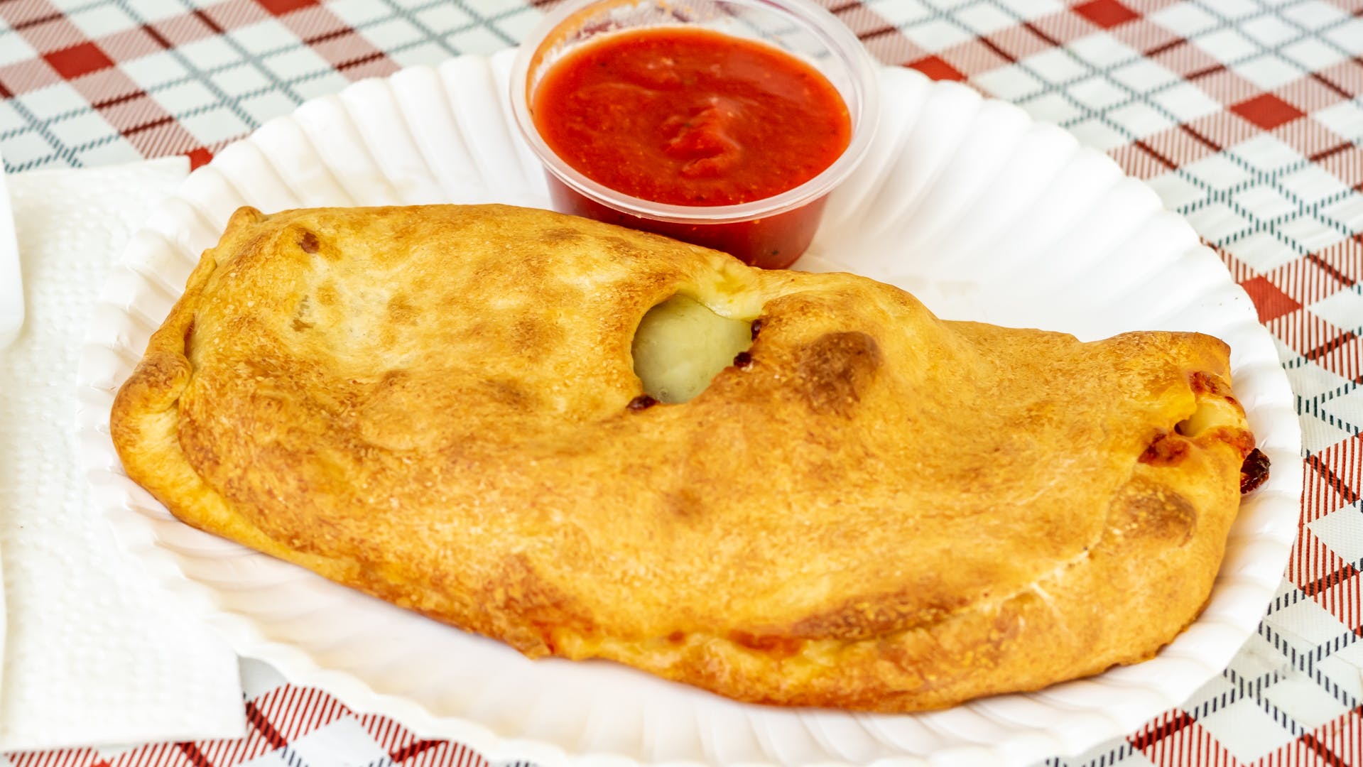 Order Calzone with Cheese - Calzone food online from Palermo Pizza & Subs store, Hannibal on bringmethat.com