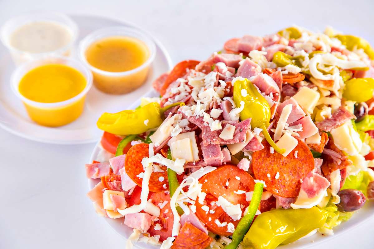 Order Antipasto Salad food online from Dino's store, Albany on bringmethat.com
