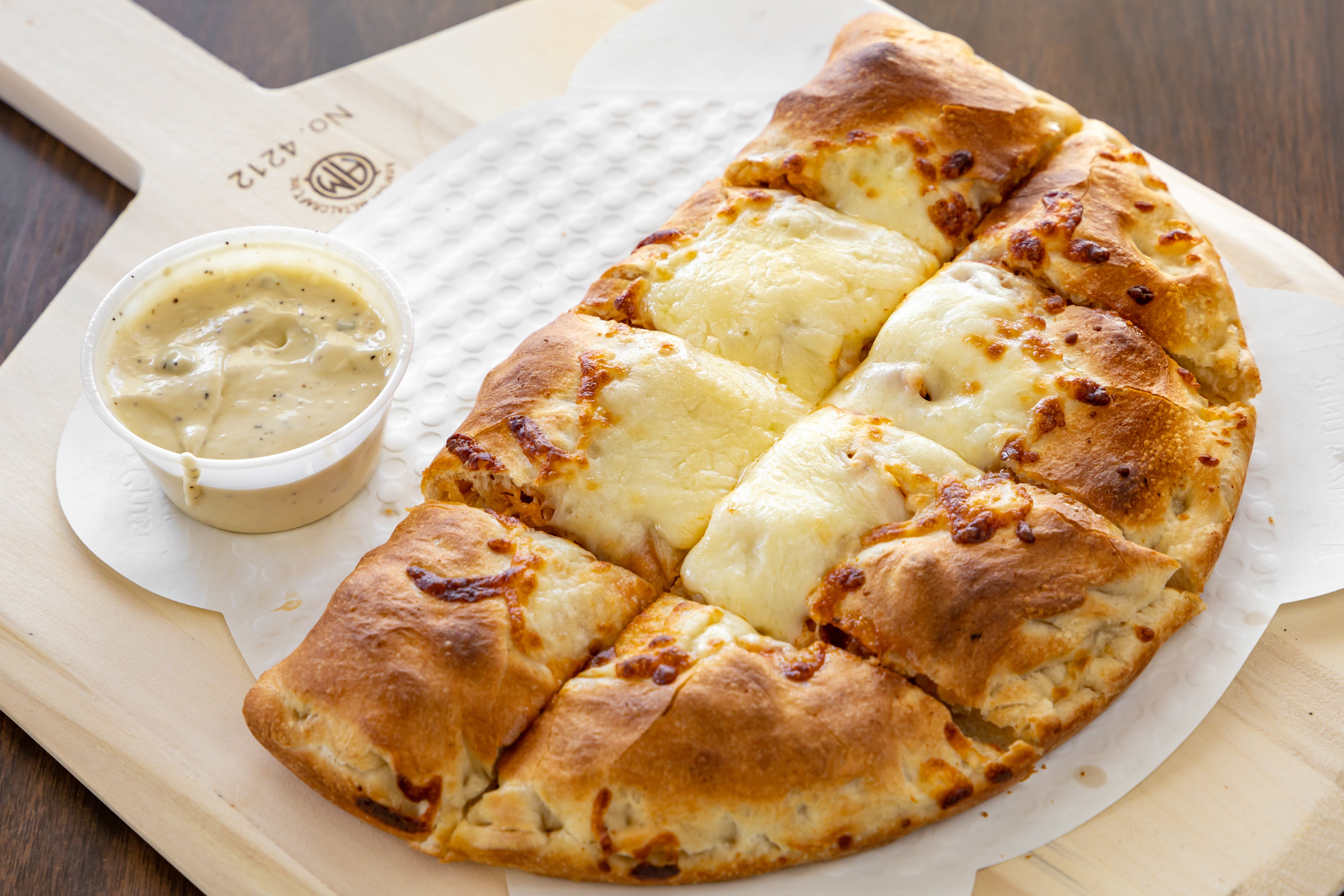 Order Steak & Cheese Calzone - Small food online from Pizza Connection store, Quincy on bringmethat.com