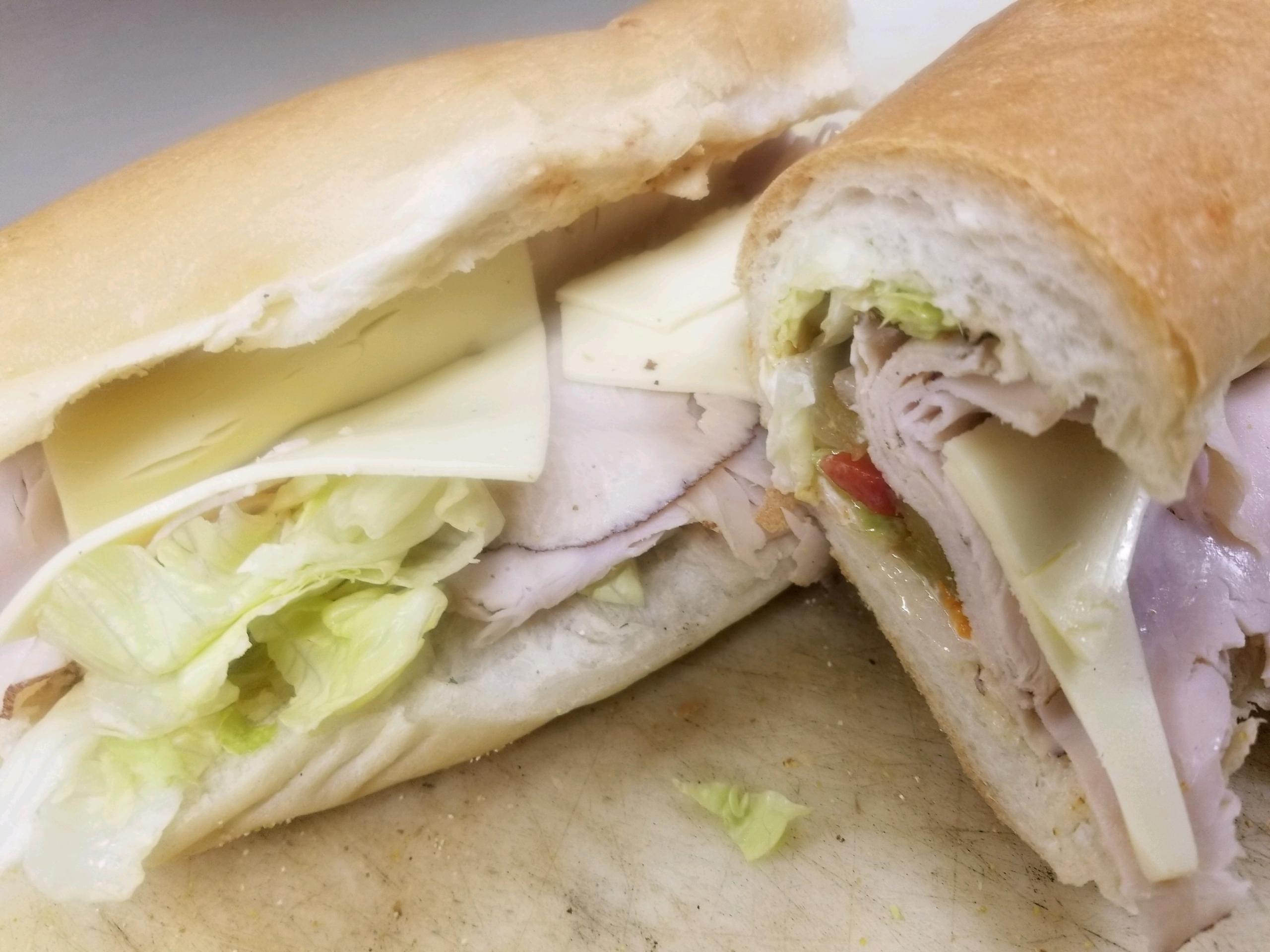 Order Large Turkey Cold Sub food online from Tony's Pizzeria store, New Hartford on bringmethat.com