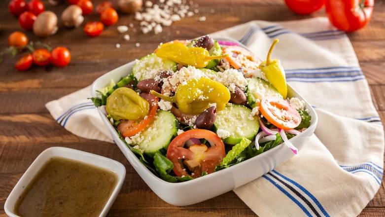 Order Greek Salad food online from Ameci Pizza & Pasta store, Los Alamitos on bringmethat.com