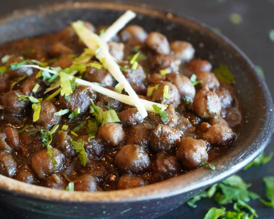 Order Pindi Chole food online from Bamboo Garden store, Morrisville on bringmethat.com