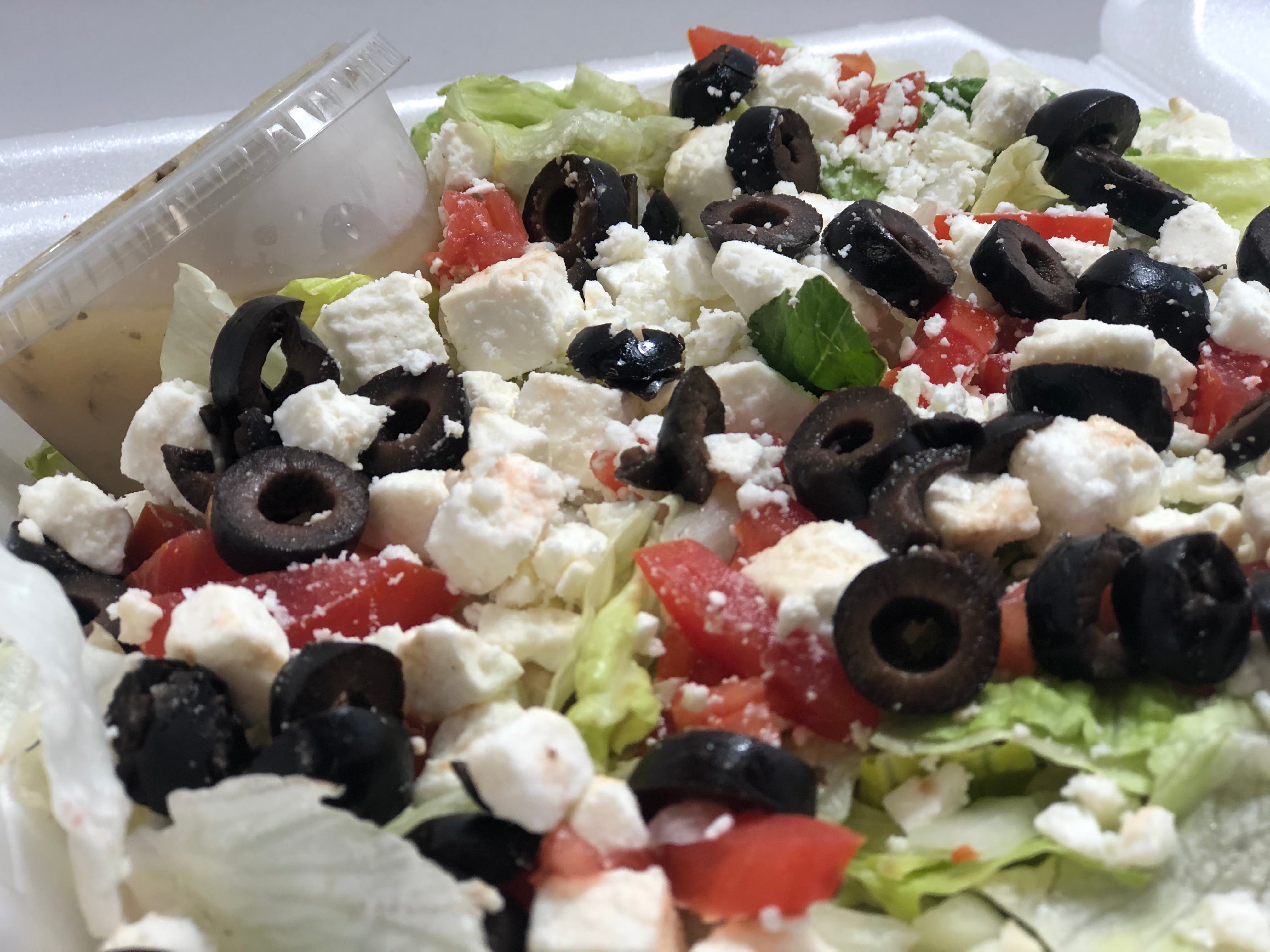 Order Greek Salad - Salad food online from Lombardo Pizza store, Wyoming on bringmethat.com