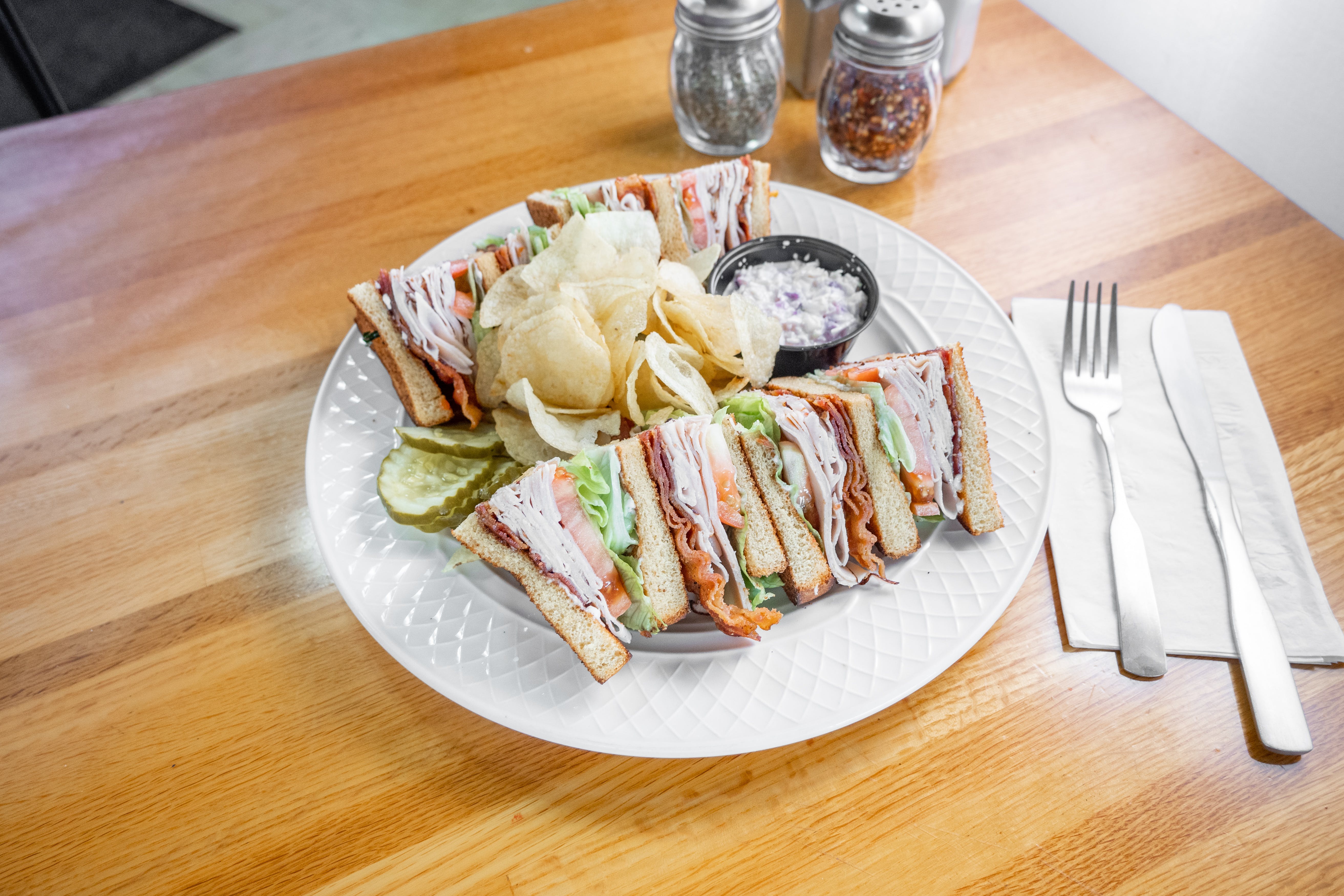 Order Turkey Club Sandwich - Sandwich food online from Tony's Pizza & Pasta store, Plymouth Meeting on bringmethat.com