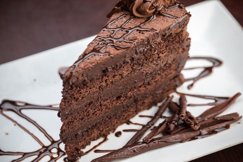 Order Chocolate Cake - Dessert food online from Napolis Italian Restaurant- Rogers store, Rogers on bringmethat.com