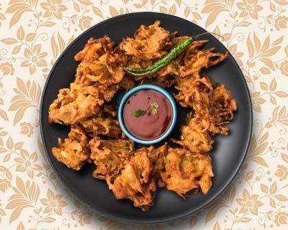 Order Onion Fritters food online from Greens and Grains store, Chantilly on bringmethat.com