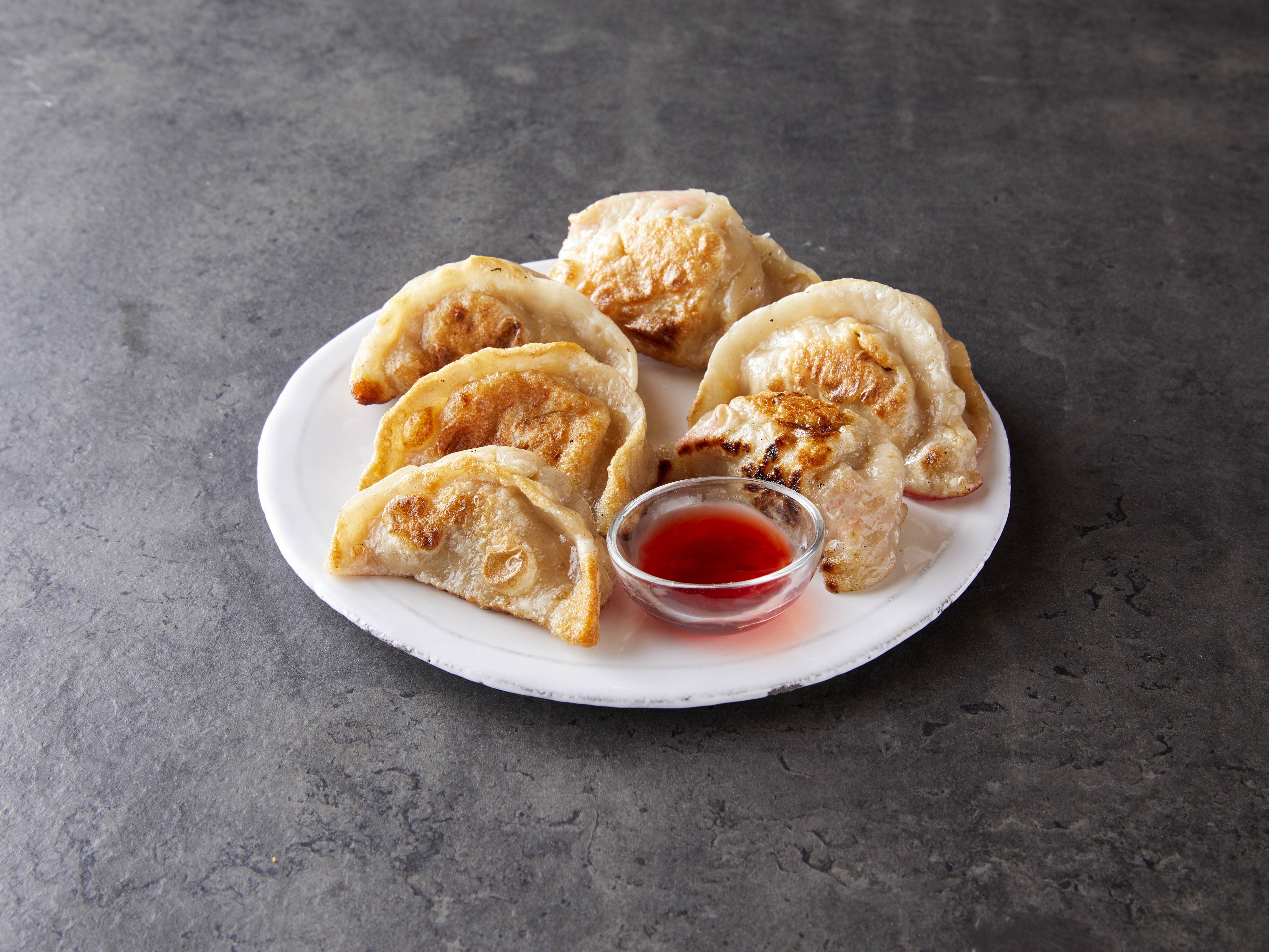 Order 05. Pot Stickers with Red Vinegar Sauce food online from Saints Alp Teahouse store, Chicago on bringmethat.com