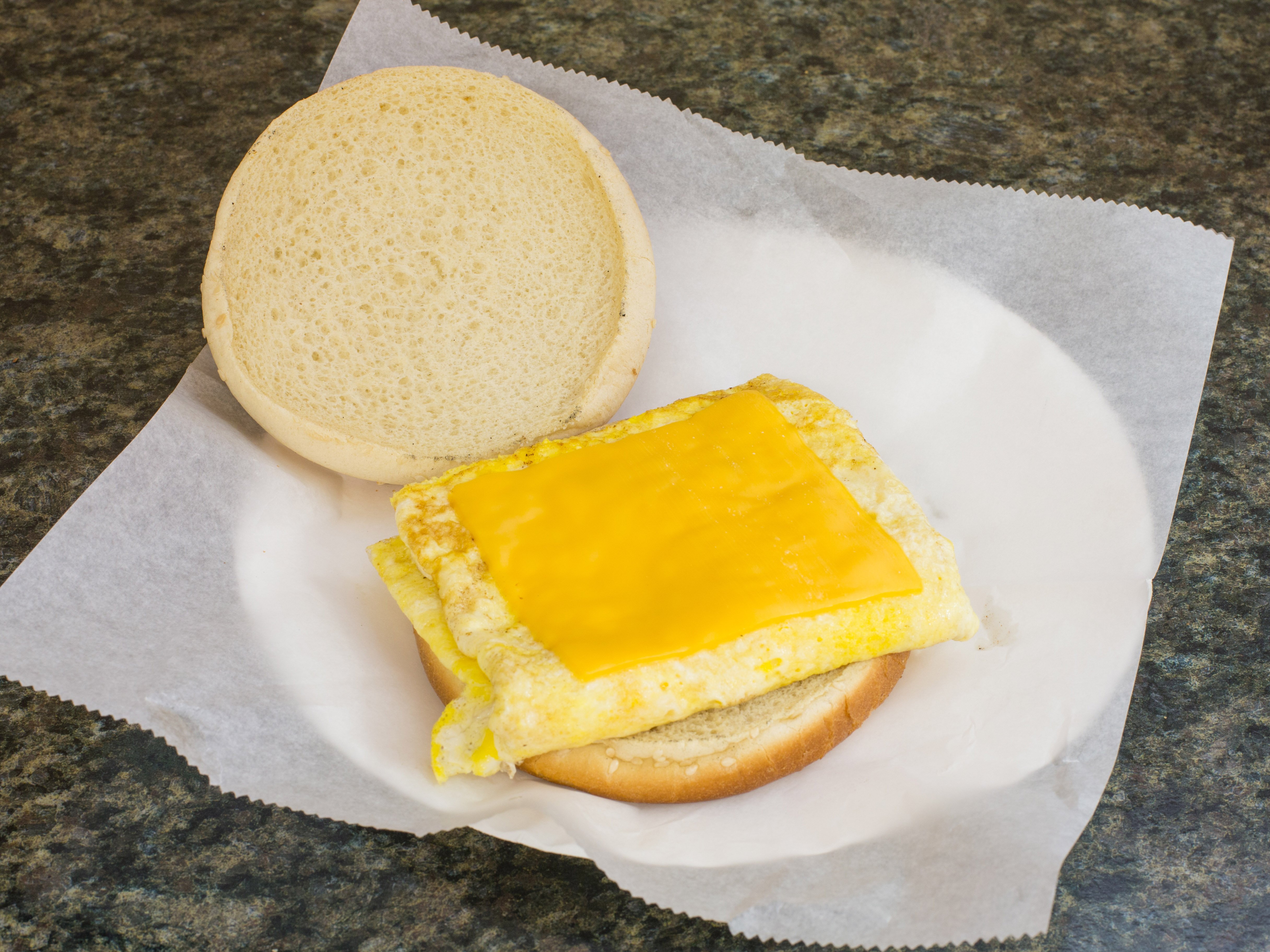 Order 2 Egg and Cheese food online from Kennedy Pizza & Fried Chicken store, Newark on bringmethat.com