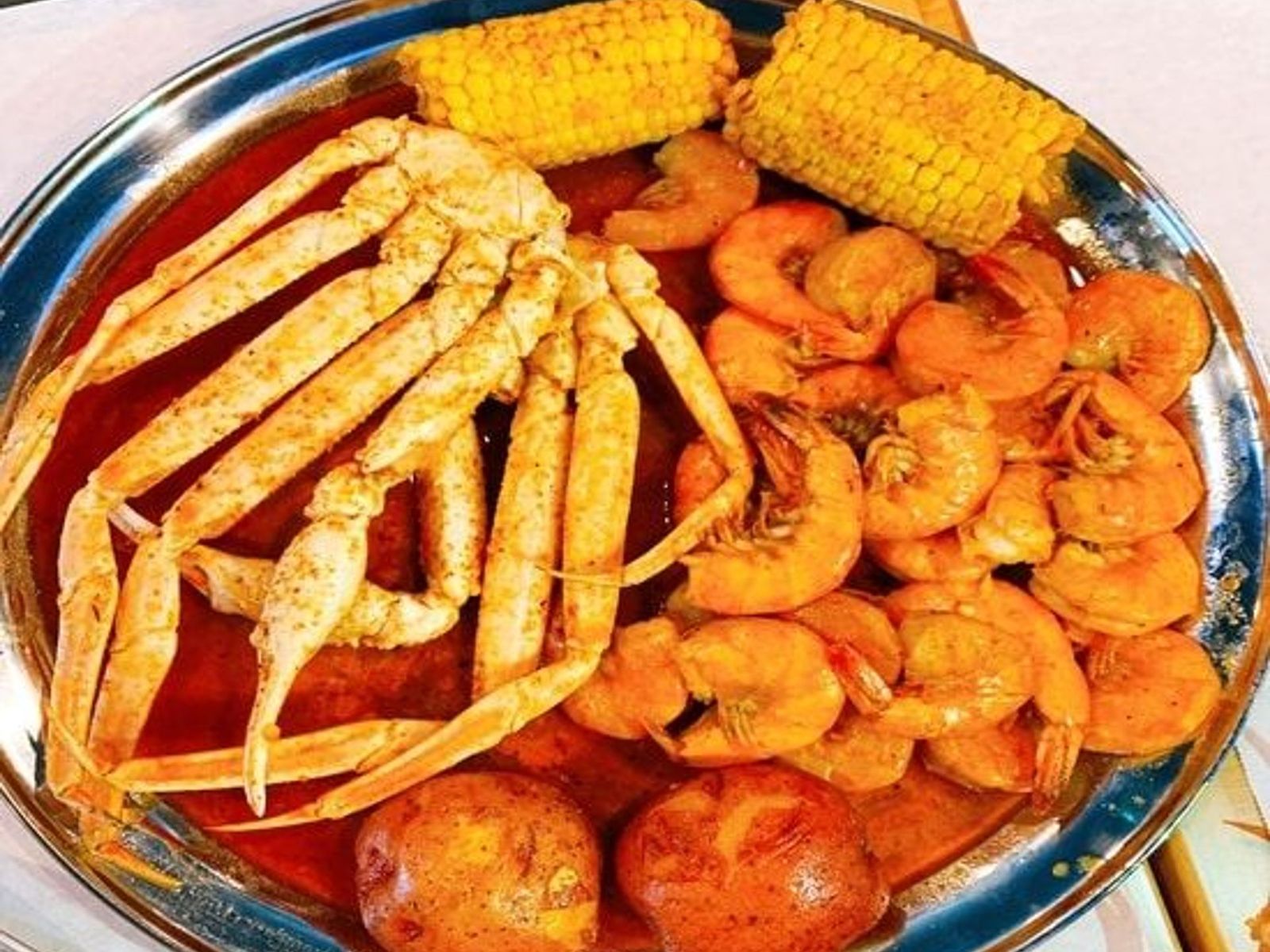 Order Combo C food online from Juicy Seafood store, Clarksville on bringmethat.com