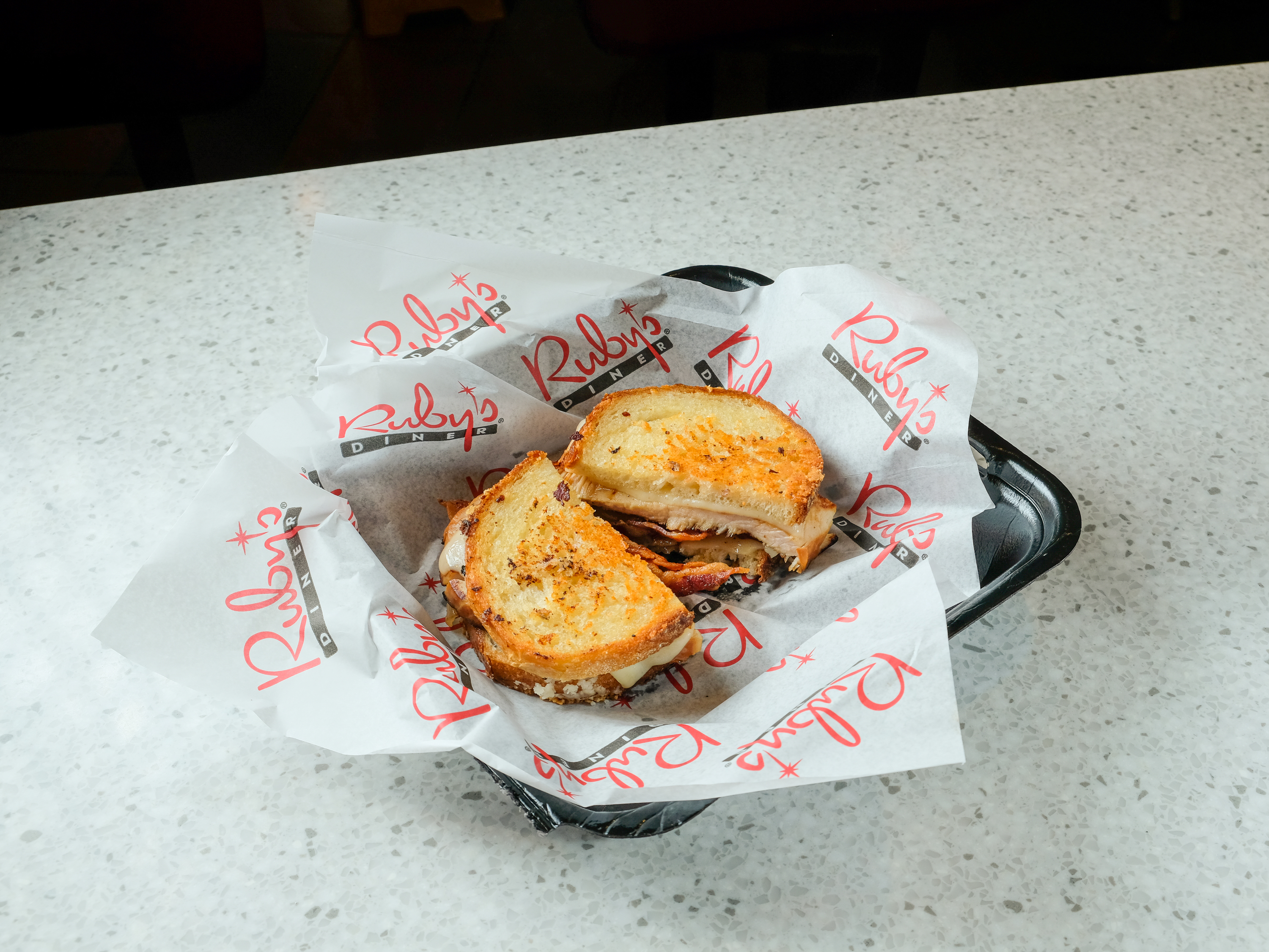 Order Turkey and Bacon Melt food online from Ruby's Diner store, Atlantic City on bringmethat.com
