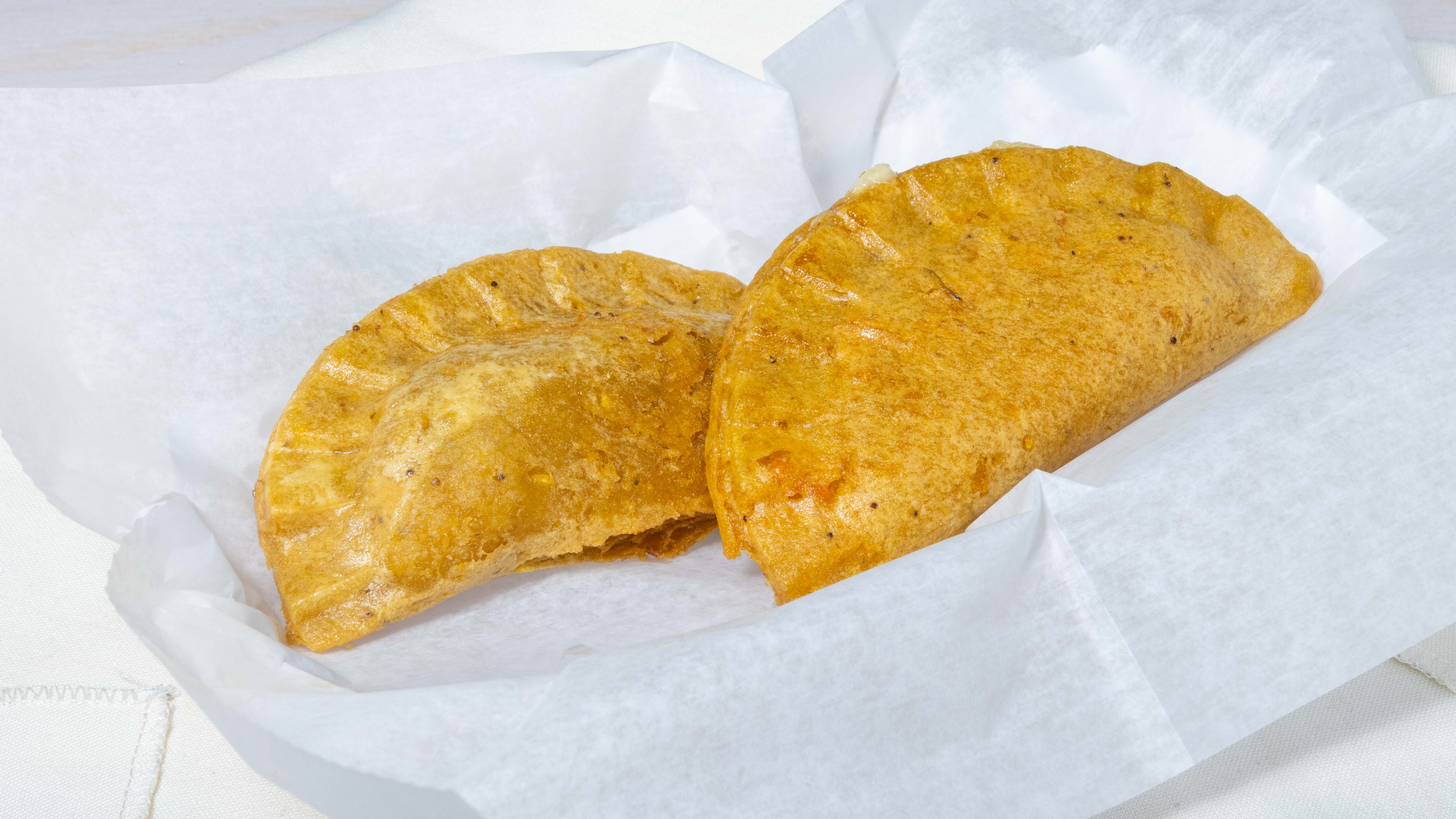 Order Plantain & Cheese Empanada food online from Fuze Eatery Empanada House & Smoothie Bar store, Eatontown on bringmethat.com