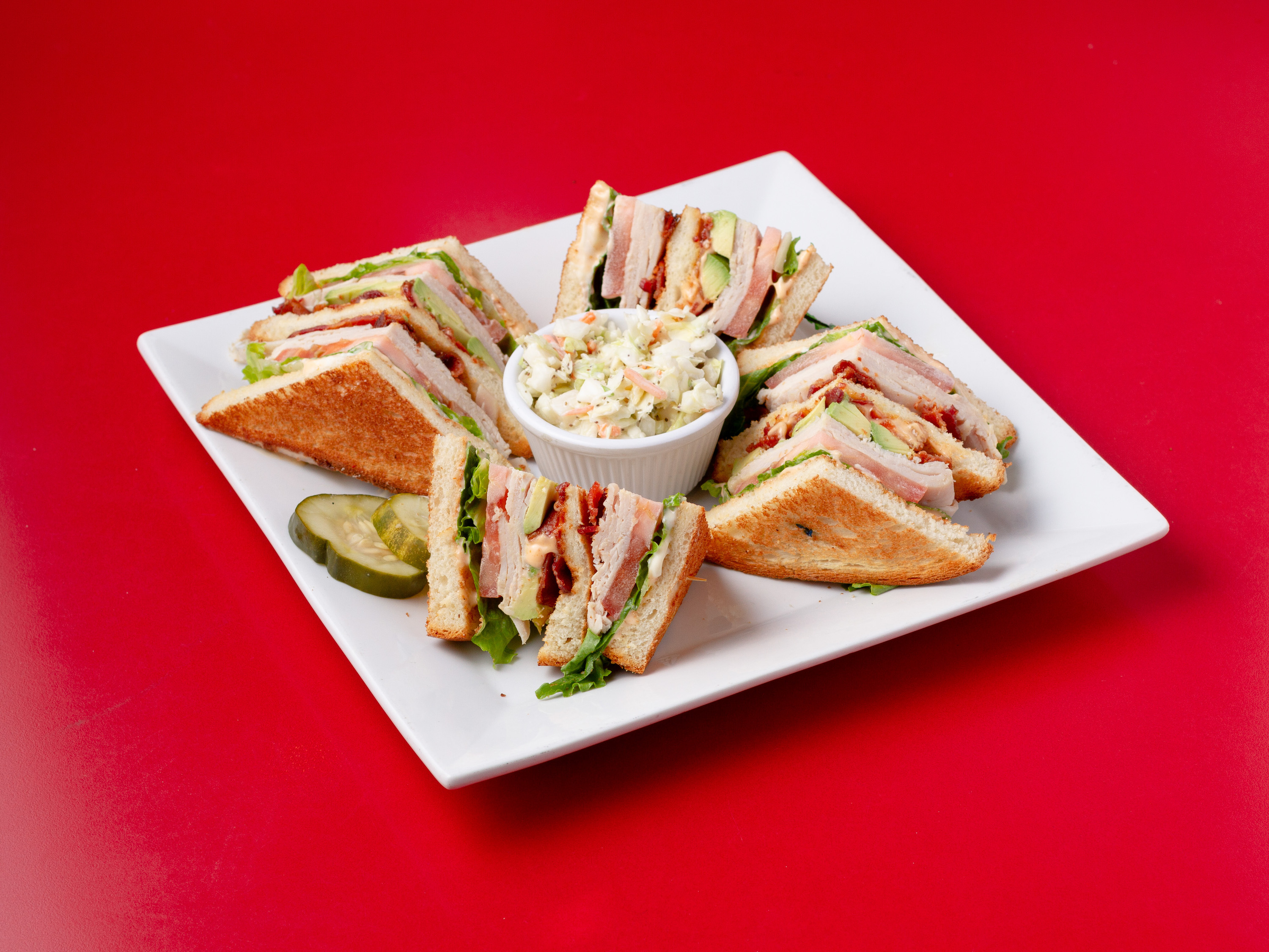 Order Turkey Avocado Club Sandwich food online from Jennings Cafe store, Catonsville on bringmethat.com