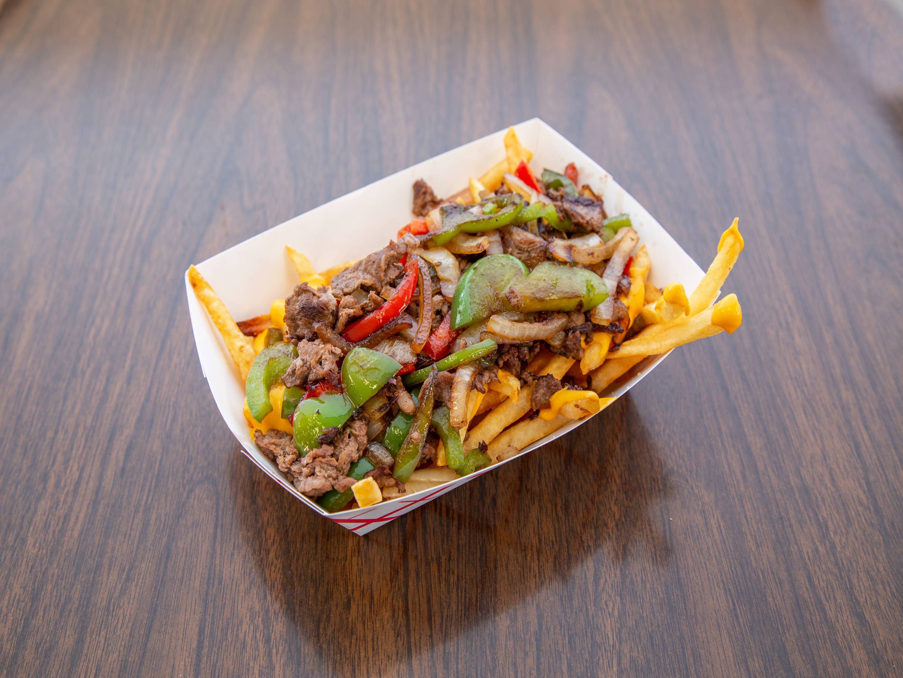 Order Philly Cheese Steak Fries food online from Pop 50 Place store, Redding on bringmethat.com