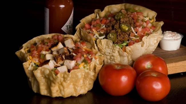 Order Taco Beef Salad food online from Fuddruckers store, Sevierville on bringmethat.com