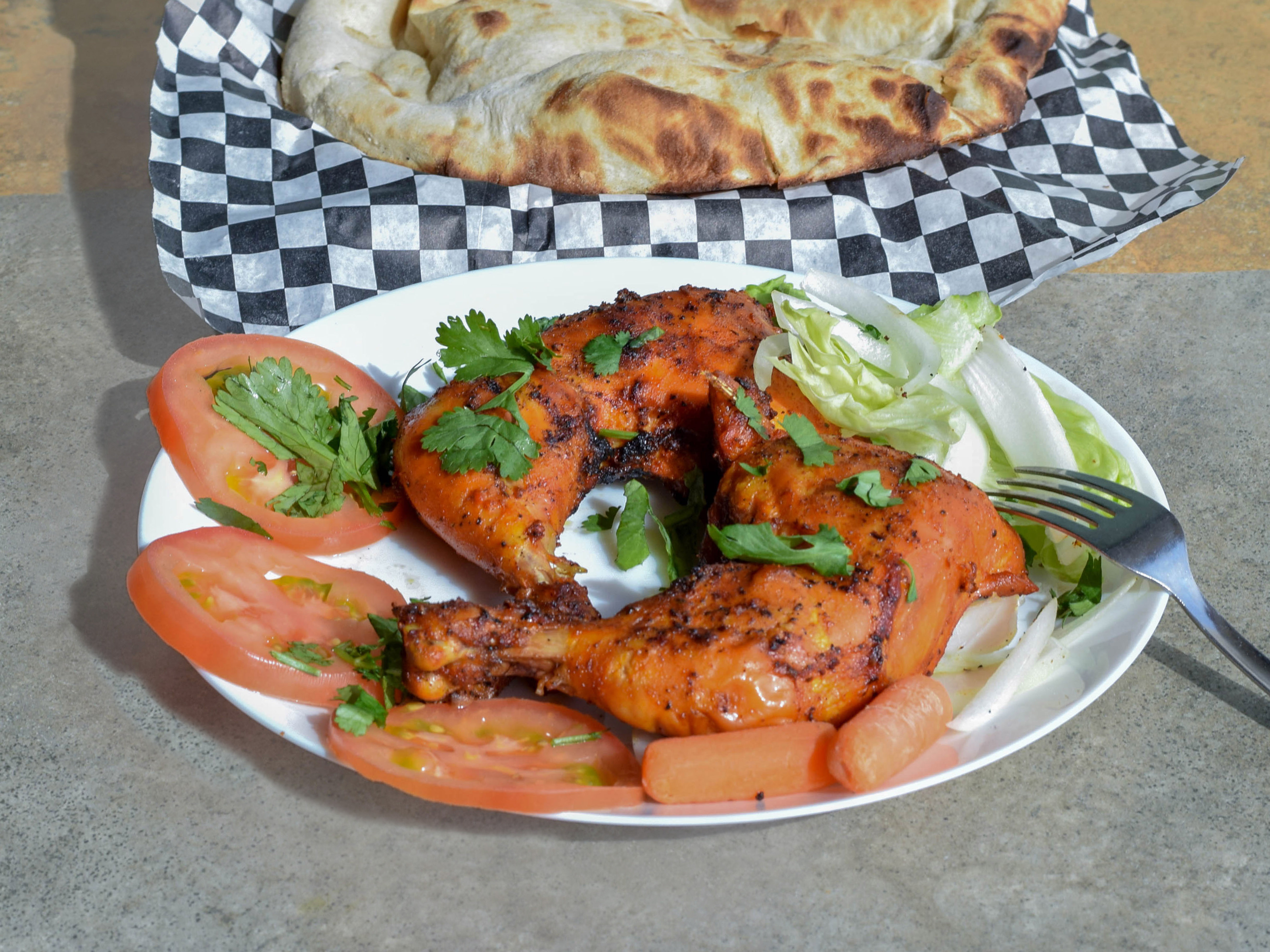 Order Chicken Tikka food online from Cafe Laziz store, Dallas on bringmethat.com