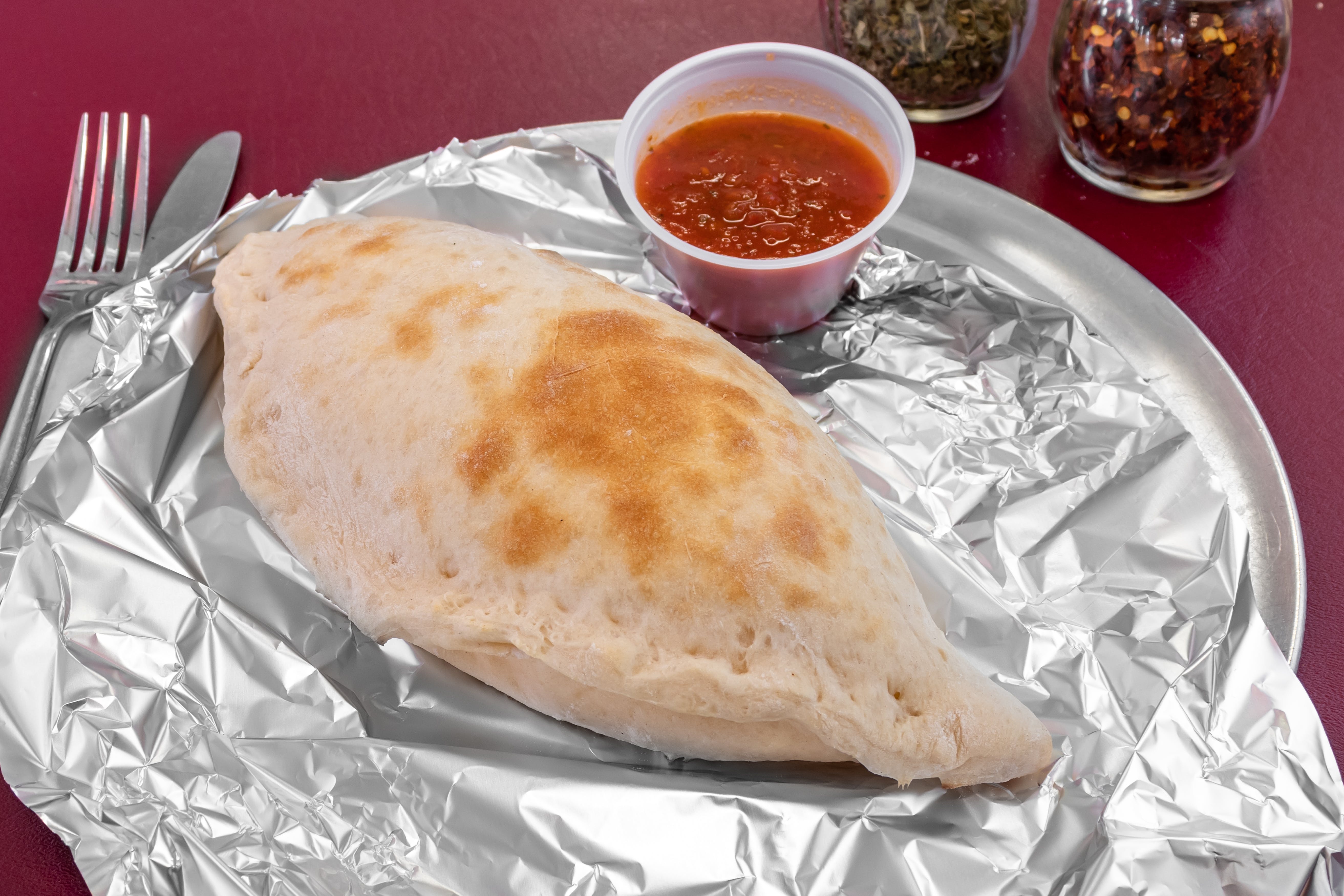 Order Cheese Calzone - Calzone food online from 3 Boys From Italy store, West Haverstraw on bringmethat.com