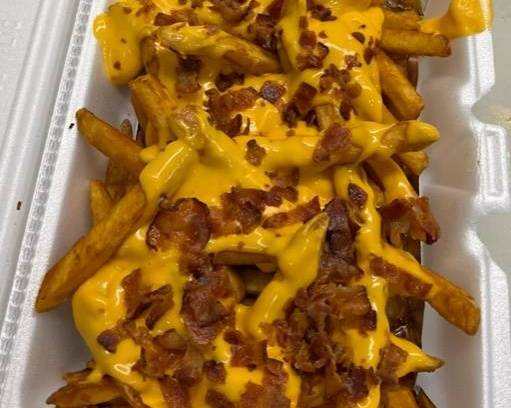 Order Bacon cheese fries food online from Uptown Deli & Grill store, Passaic on bringmethat.com