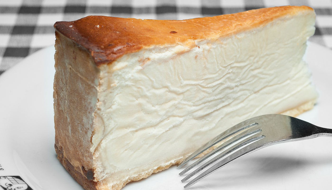 Order Authentic NYC Carnegie Deli Cheesecake - Dessert food online from Bucceto's store, Bloomington on bringmethat.com