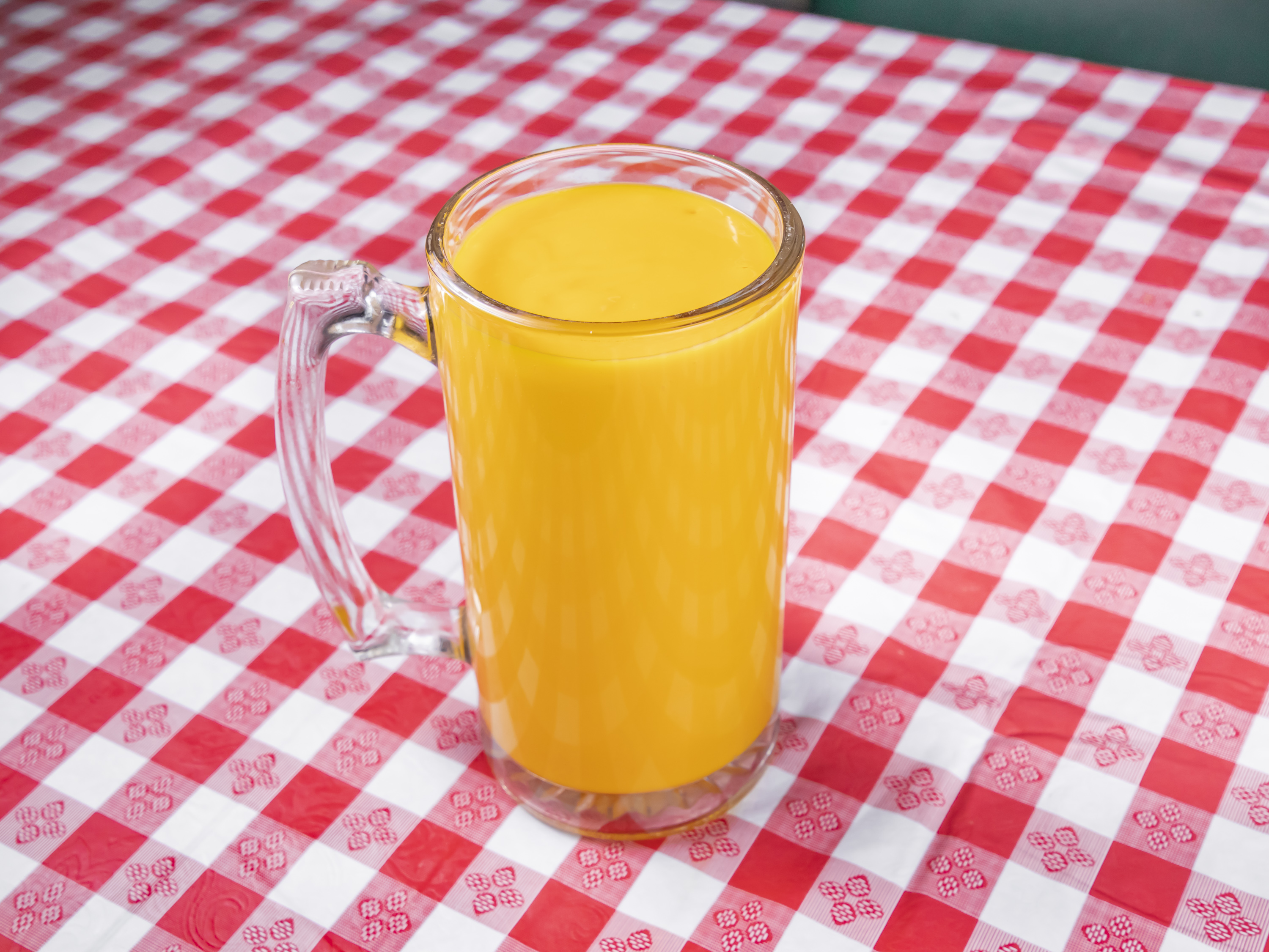 Order Mango Lassi food online from Indo-Pak Grocery & Restaurant store, Riverdale on bringmethat.com
