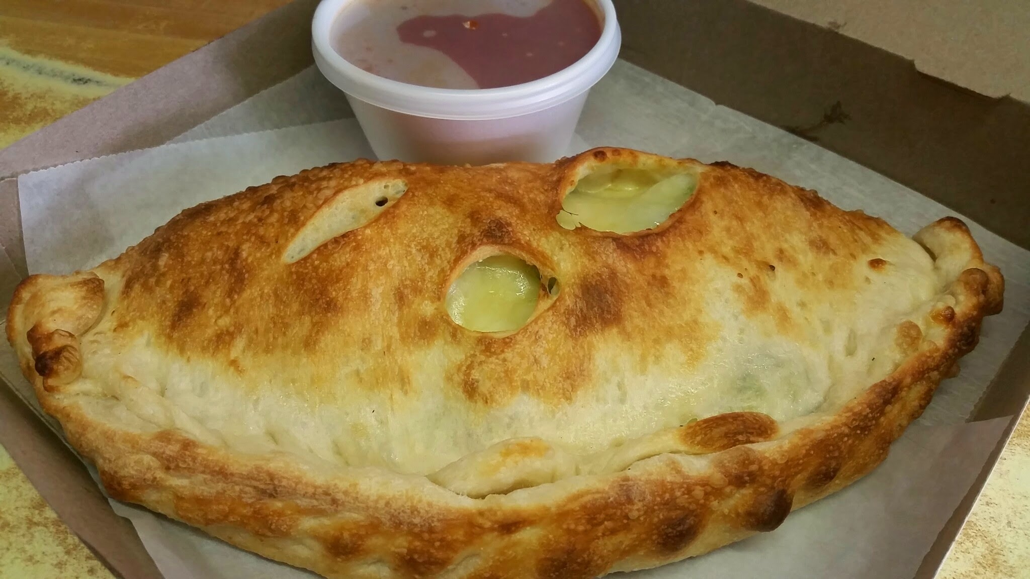 Order Broccoli Calzone food online from Our Original Pizzeria store, Schenectady on bringmethat.com
