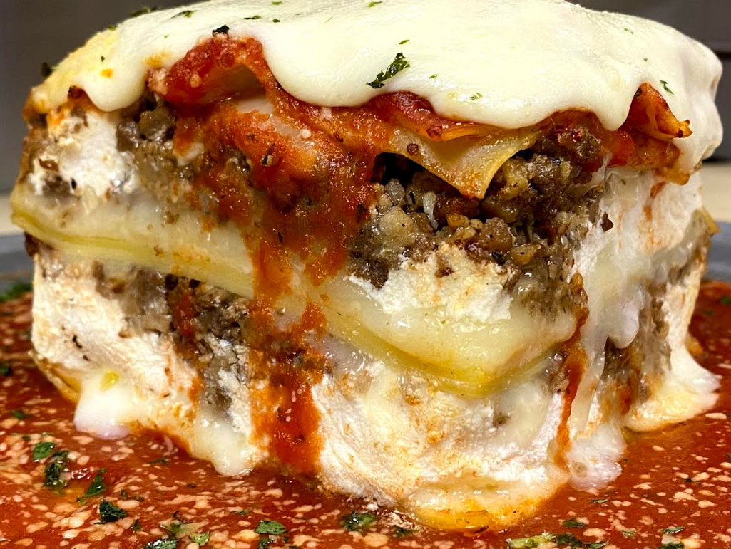 Order Homemade Meat Lasagna food online from Mario's Pizzeria store, Syosset on bringmethat.com