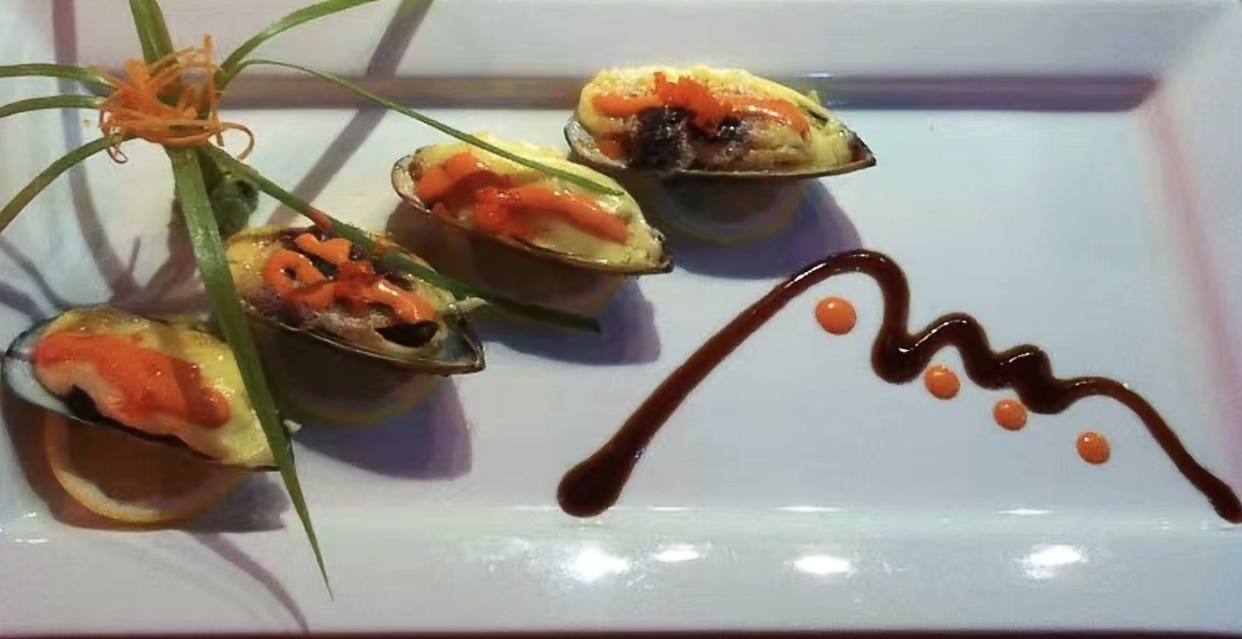 Order Cajun Mussels Appetizer food online from Nagoya Japanese Restaurant store, Long Beach on bringmethat.com