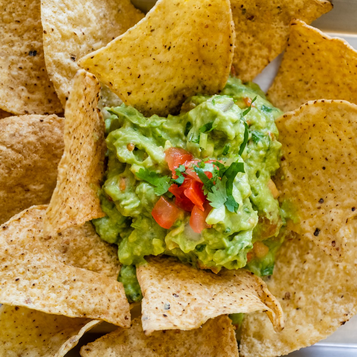 Order Guacamole and chips food online from Sabroso Burrito store, Schaumburg on bringmethat.com