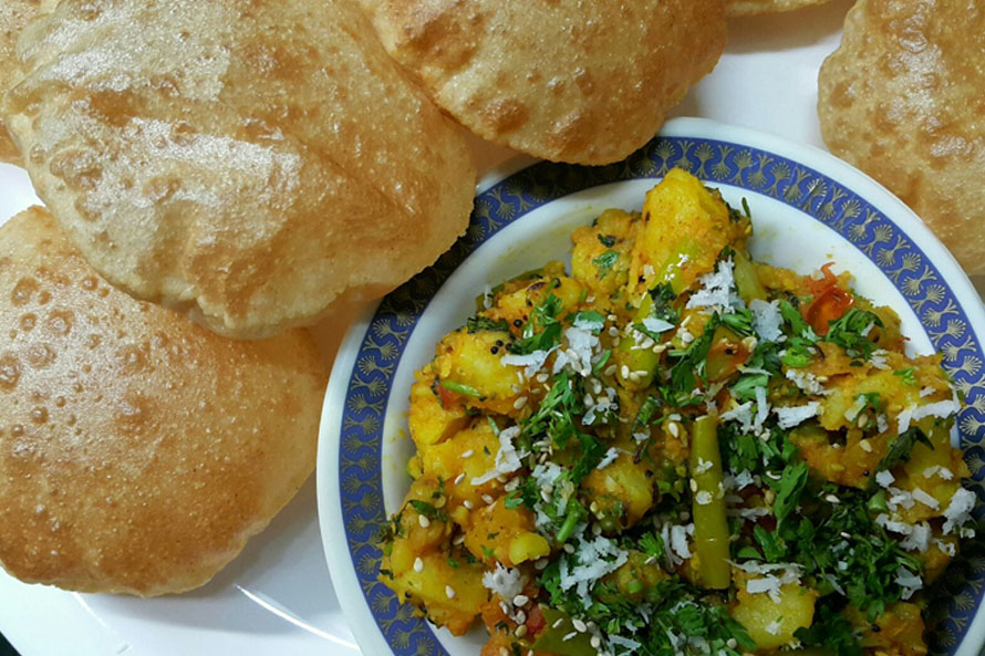 Order Poori Bhaji food online from Priya Indian Cuisine store, Lowell on bringmethat.com